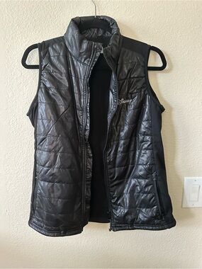 Disney Parks  Women's Black Quilted Puffer Vest with Logo size M/ NWOT 1300